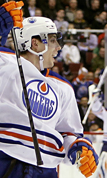 Perron scores 3 to lead Oilers past Canucks